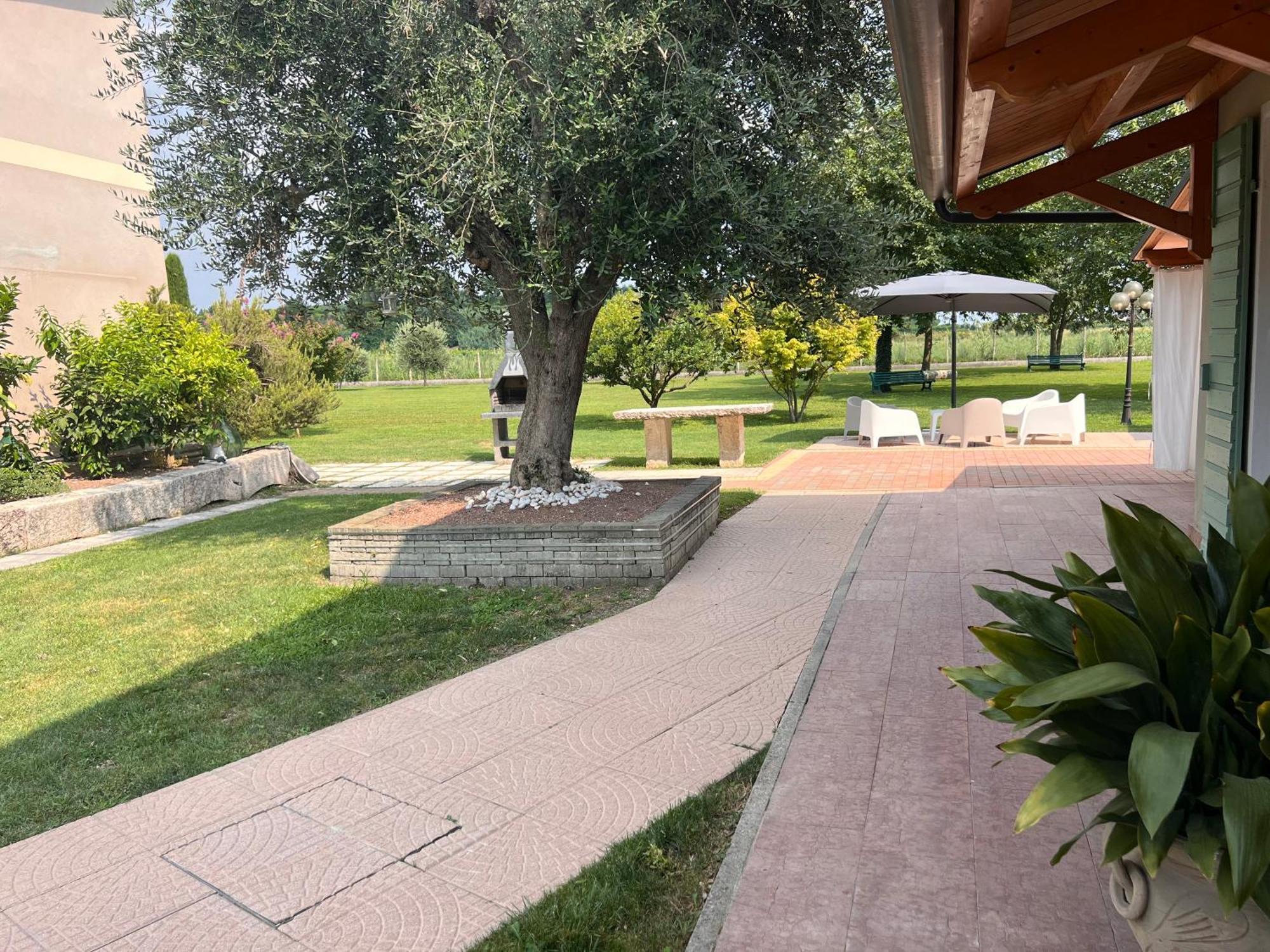Appartamento "Casa Vacanze Corte Ara Decima" Sona Bagian luar foto